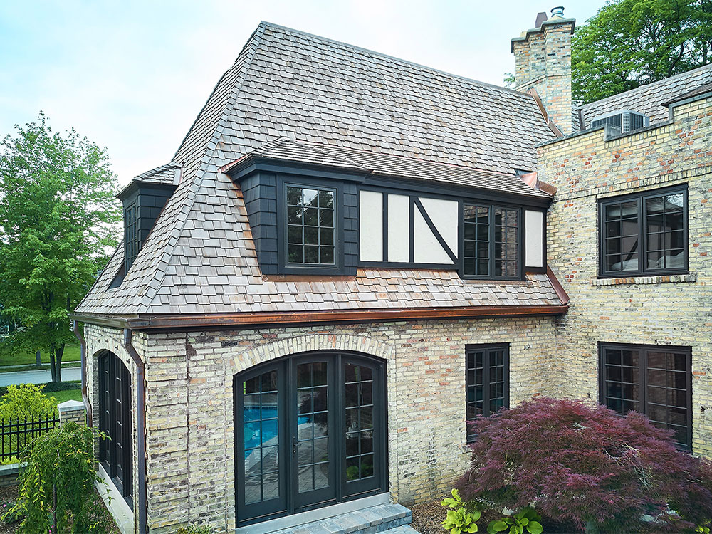 2nd Aerial view of the full roofing work Buist provided for a Tudor style residential home in East Grand Rapids, MI