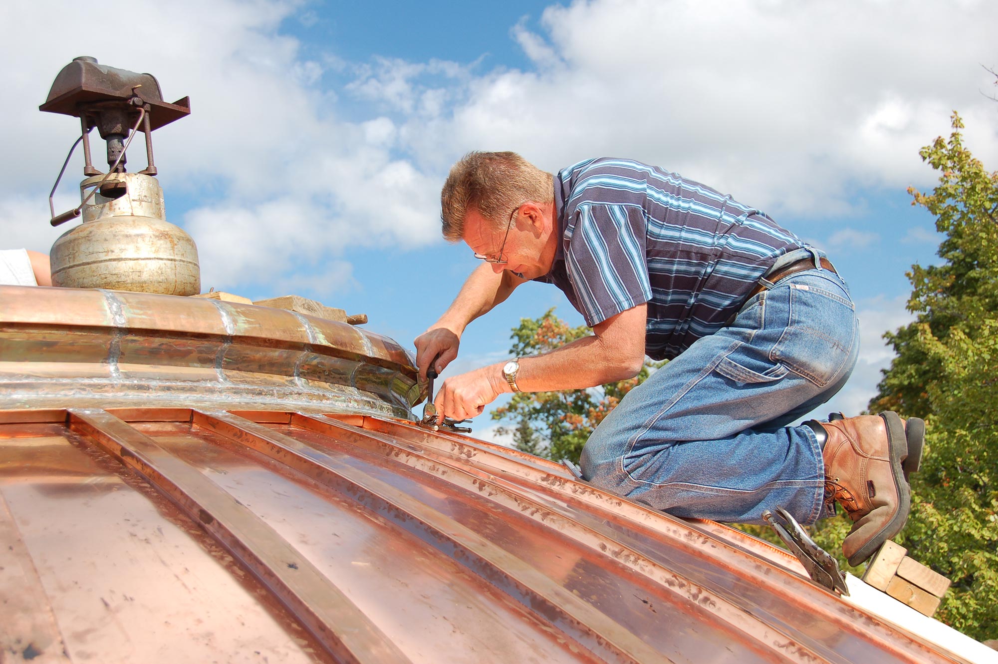 Jim Buist working on the copper dome.