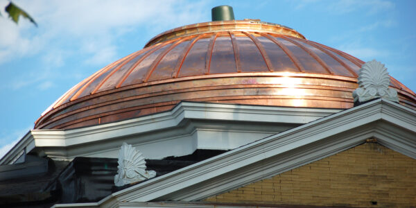 A close-up of the copper dome on Wexford County Historical Society Carnegie Library Museum