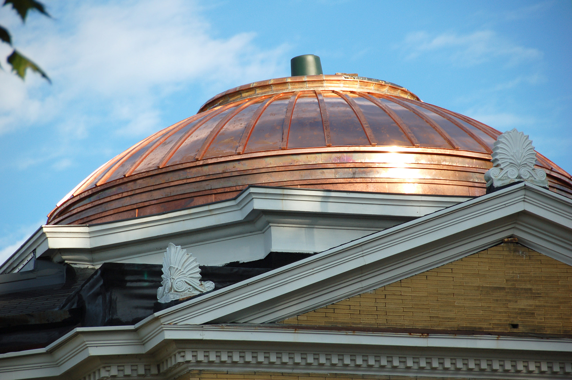 A close-up of the copper dome on Wexford County Historical Society Carnegie Library Museum