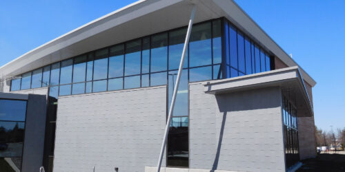 The large windows and custom metal siding on Calvary Church Grace Beyond