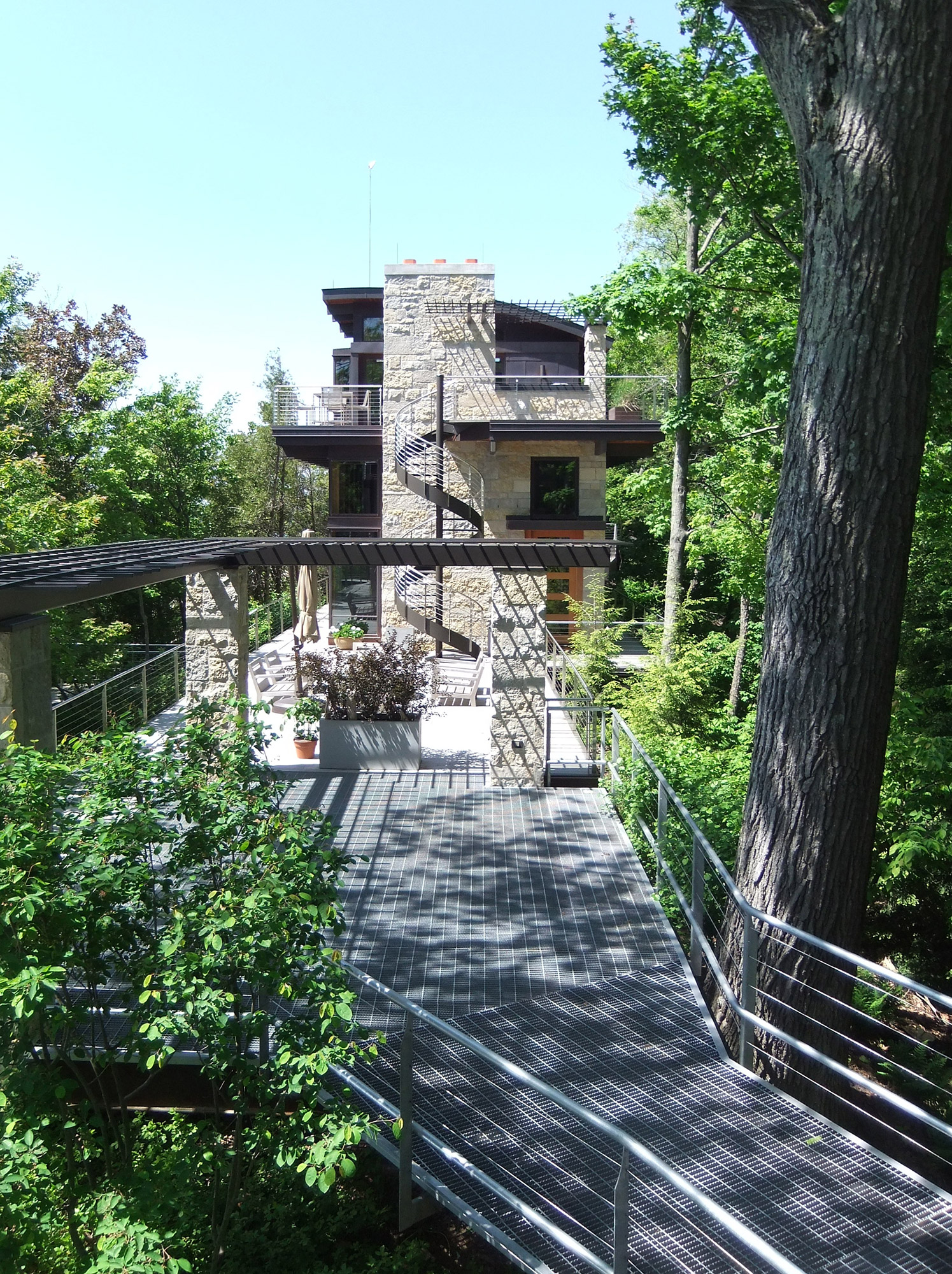 This angle shows the custom rock work on the side of this Michigan lakeshore home.