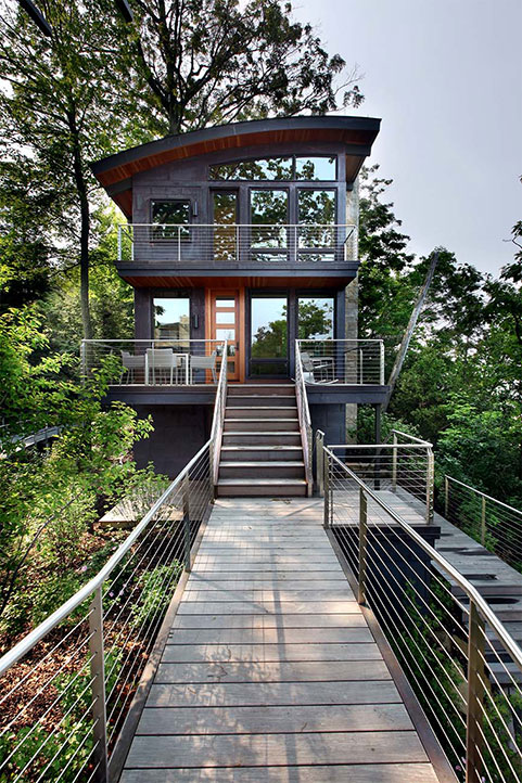 view of the Dunes residential sheet metal construction project showing the elevated walkway to the front of the home.