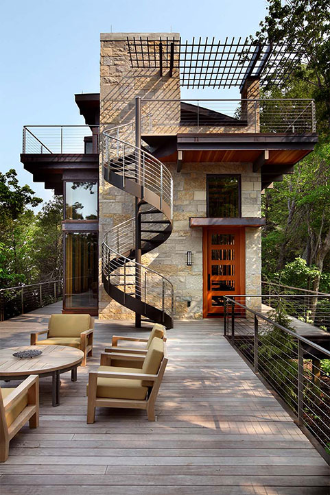 Another view of the Dunes residential sheet metal construction project showing the spiral staircase and main deck of the home.