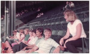 Brian Ritsema is in the stands with a group of fellow Buist Sheet Metal employees at a 1980s Tigers Baseball Game company outing