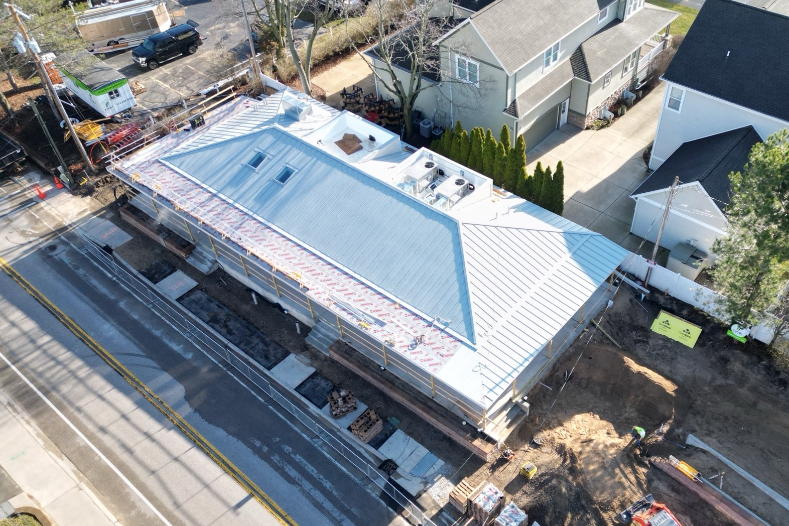 Exterior drone shot of the top of the sheet metal roof that Buist Sheet Metal installed on the Ottawa Beach General Store
